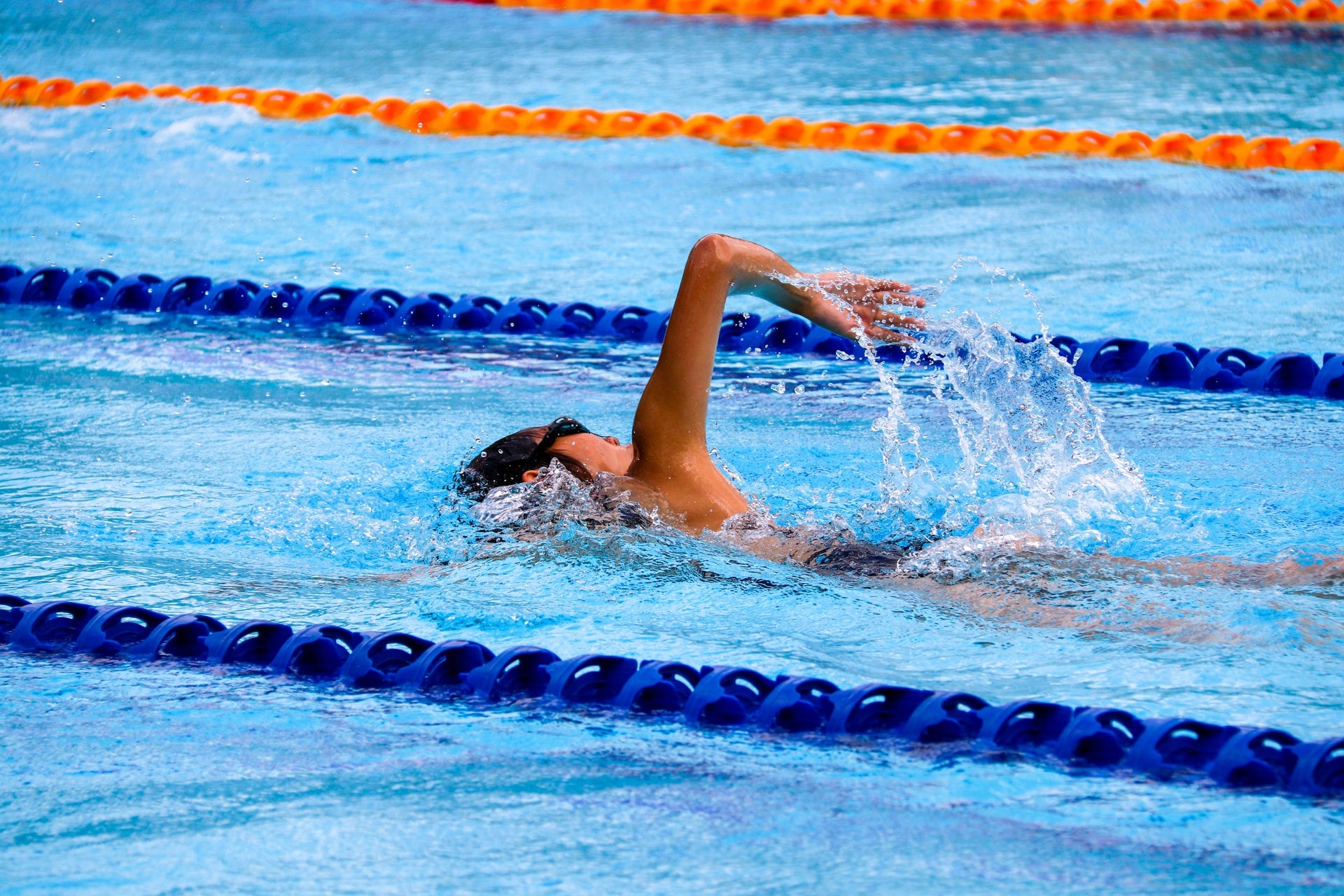 person swimming for exercise