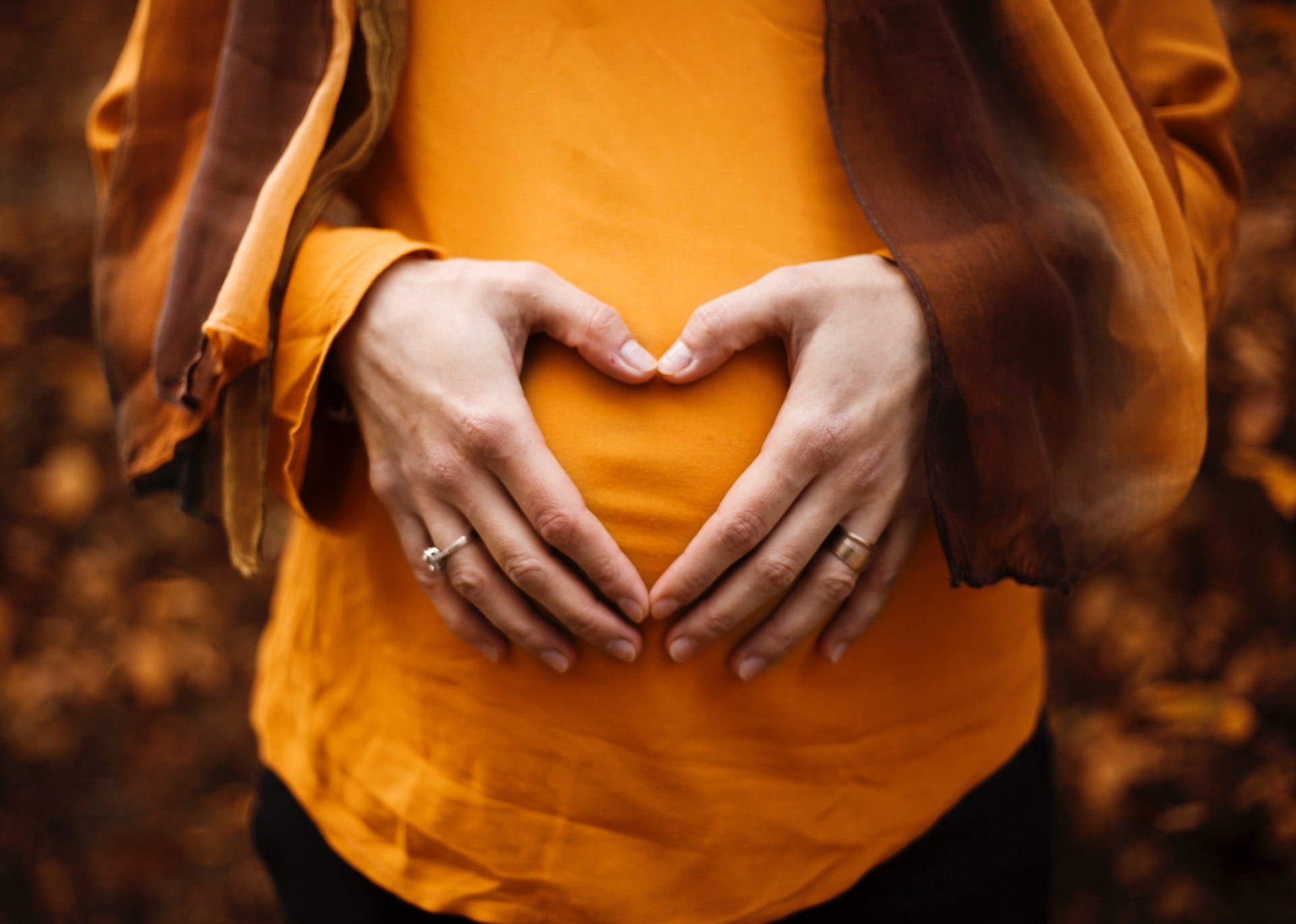 woman holding stomach digestive tract