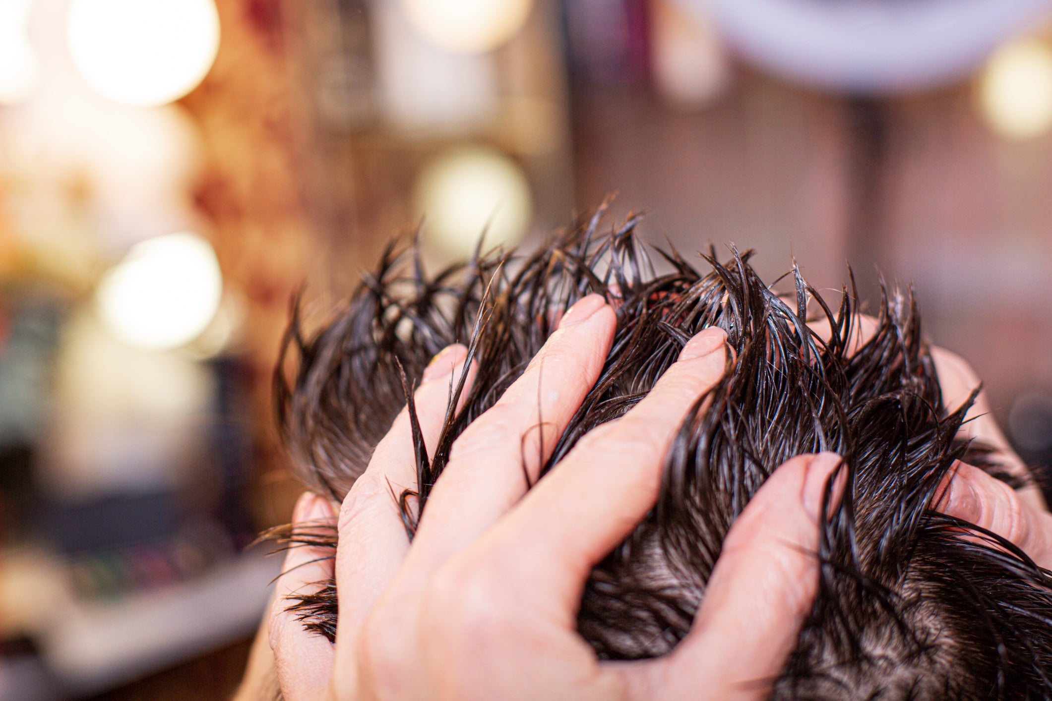 man doing all-natural hair care