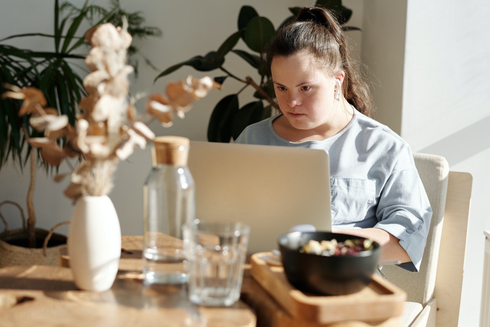 woman looking at computer