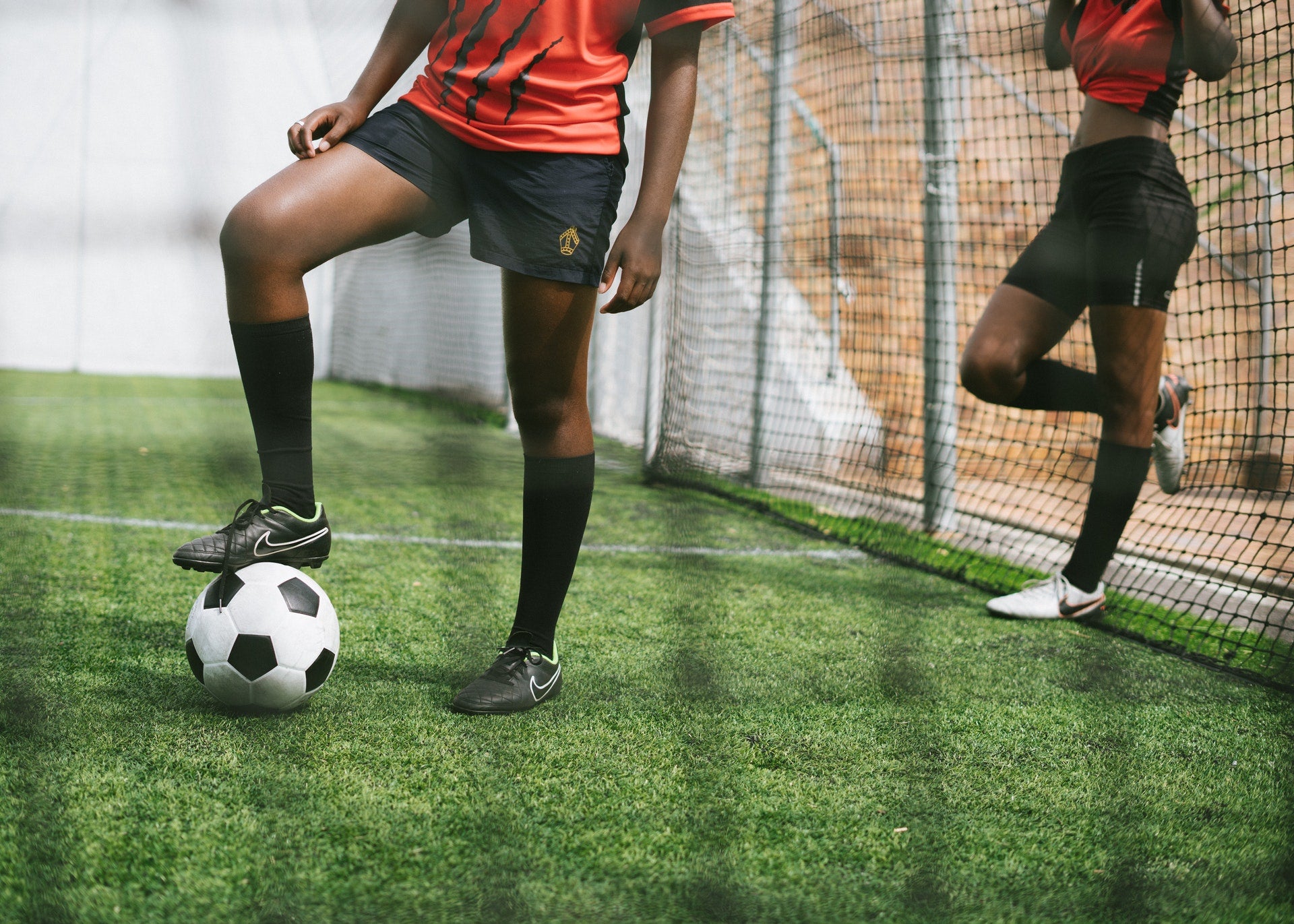 teen girls playing soccer