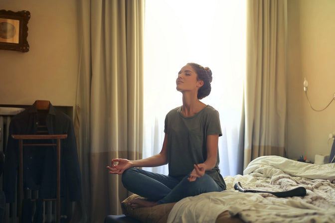 woman practicing breathing exercises