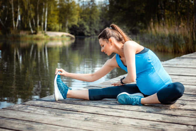 woman performing prenatal exercises