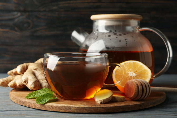 cup and pot of green tea