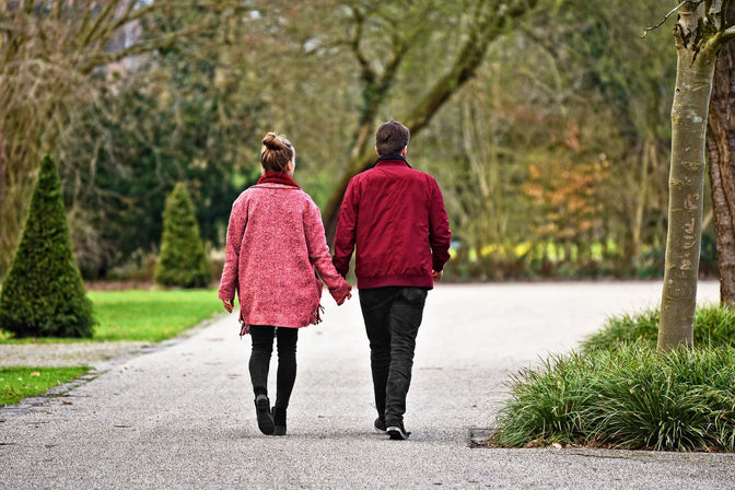 couple walking to promote blissful sleep