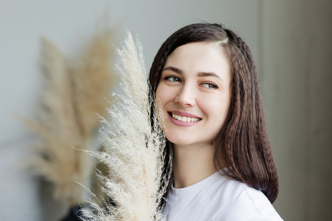 woman smiling with healthy white teeth