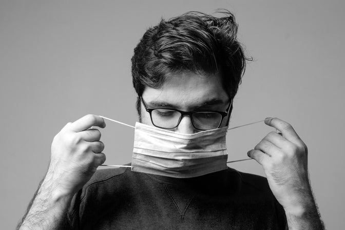 man with bad breath from wearing mask