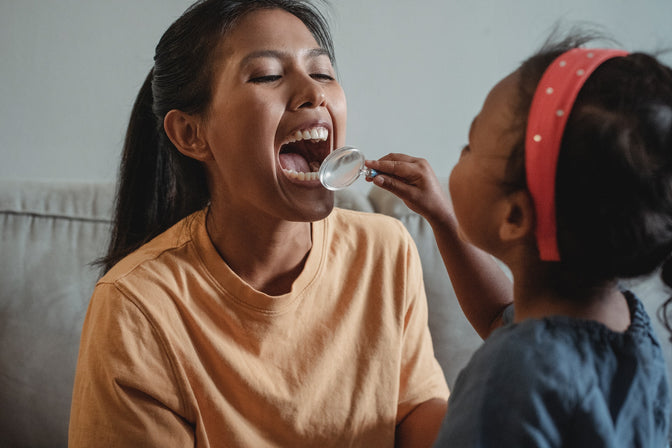 woman calming child's dental anxiety