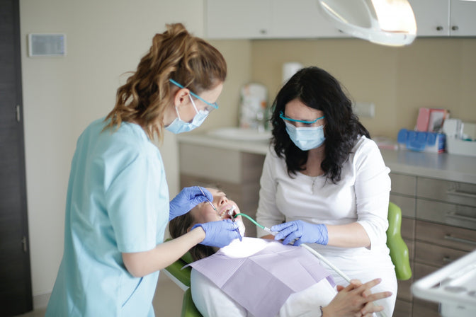 dentist filling a cavity