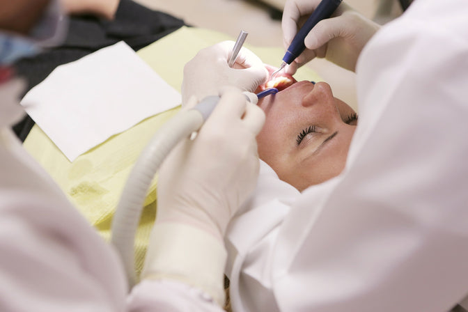 girl getting dental filling