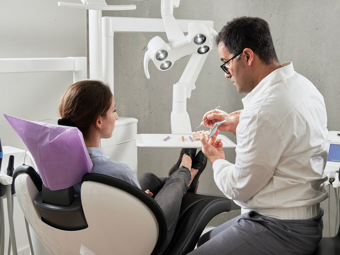 dentist and patient discussing diabetes tooth health