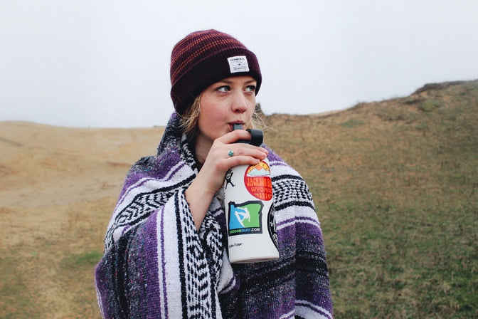 girl with dry mouth sipping water