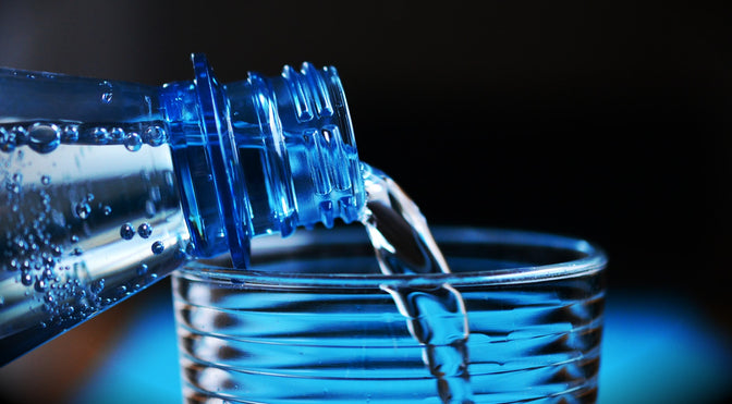 glass and bottle of water