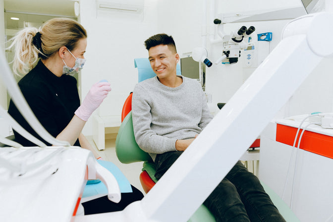 man getting dental check-up prevent gingivitis