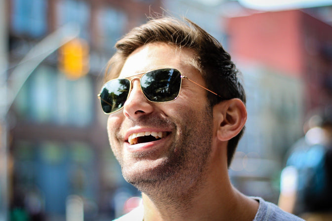 smiling man after cosmetic dentistry