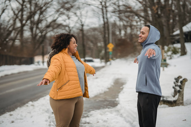 couple exercising outside in winter