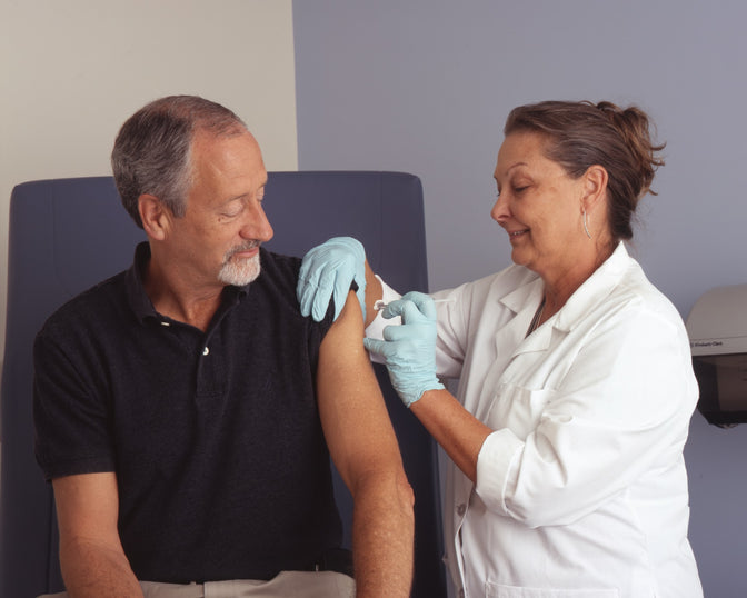 man getting a flu shot