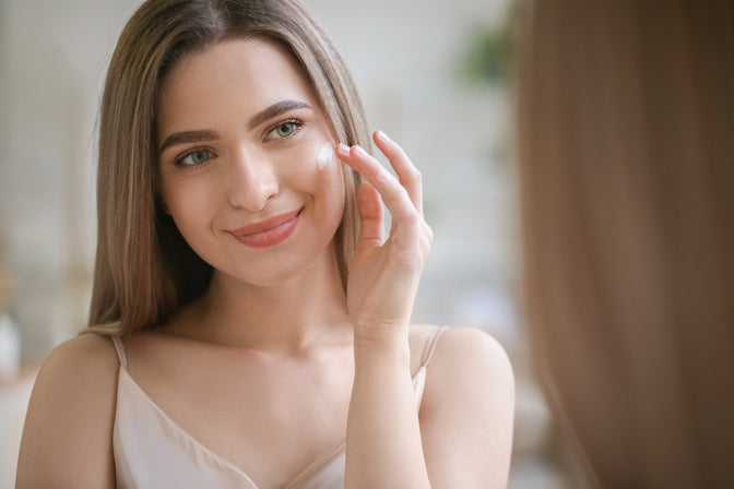 woman using green skincare