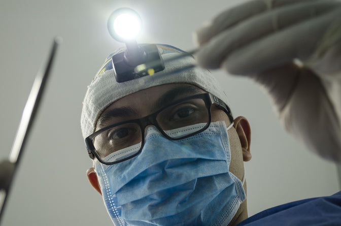 dentist addressing loose teeth