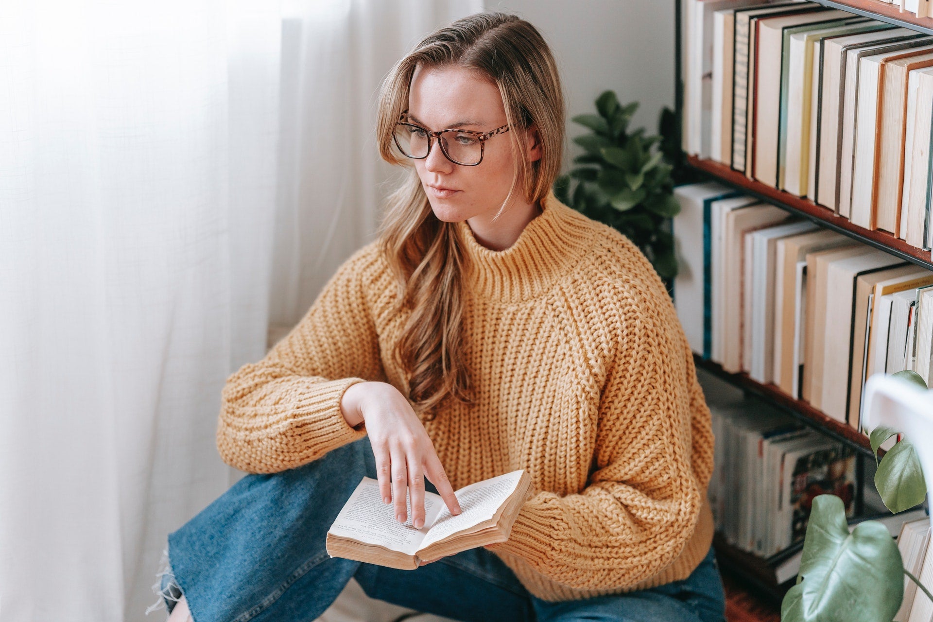 woman reading book for mental health