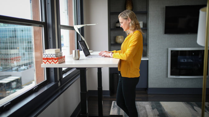 woman working at standing desk