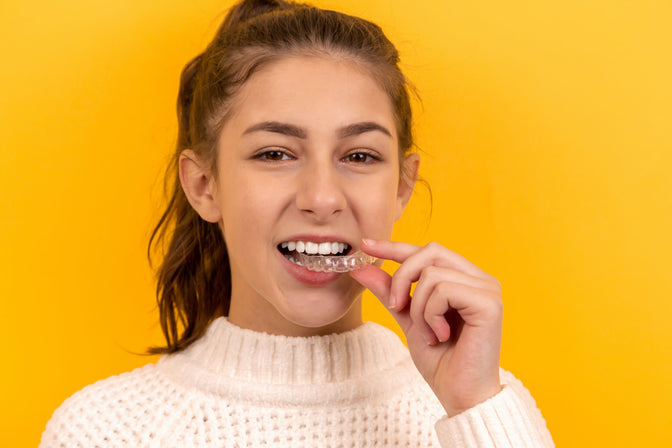 girl wearing mouthguard