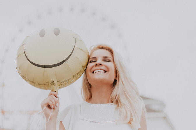 smiling woman with natural teeth