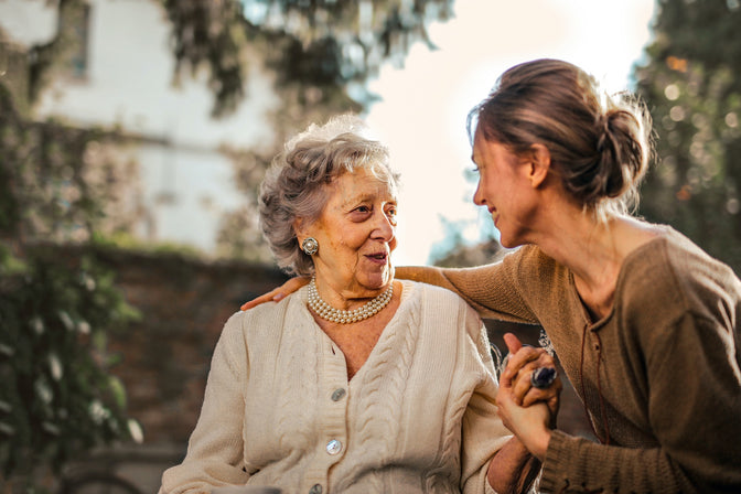 senior woman and daughter