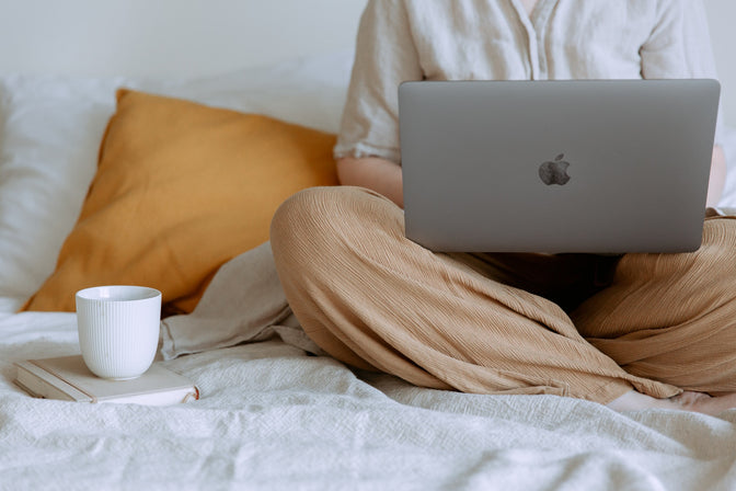 person practicing self-care while researching a startup