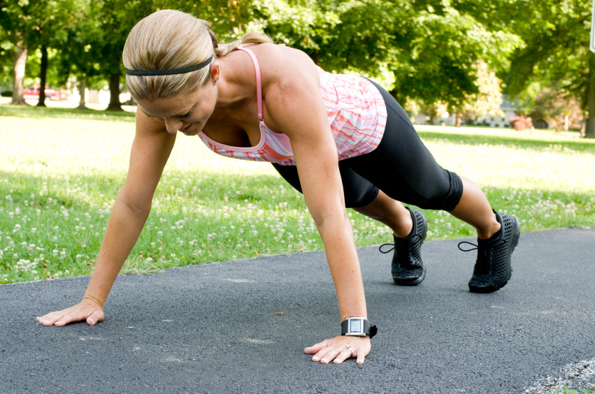 woman exercising with push-ups