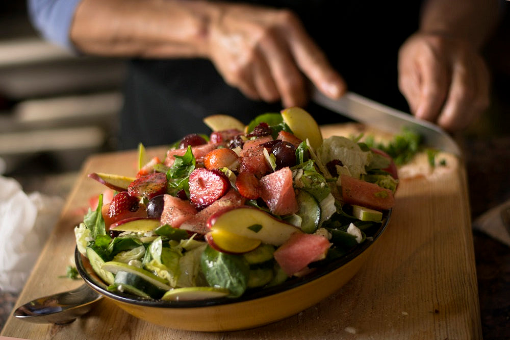 preparing a plate full of green to develop healthy eating habits