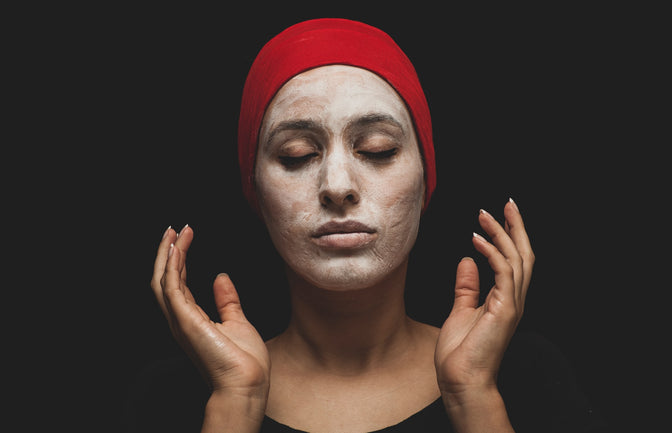 woman using snail slime for skin