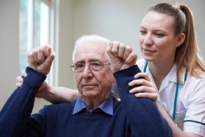 woman helping elderly - How To Spot And Prevent A Stroke