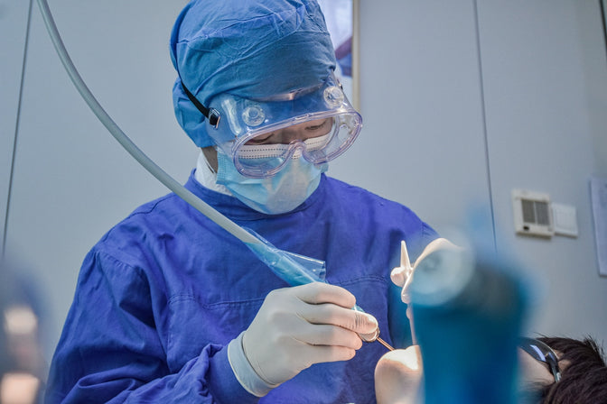 dentist replacing lost tooth