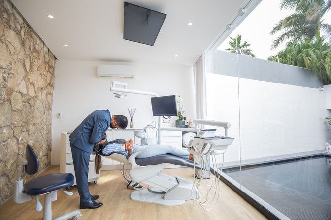 dentist performing tooth restoration procedure