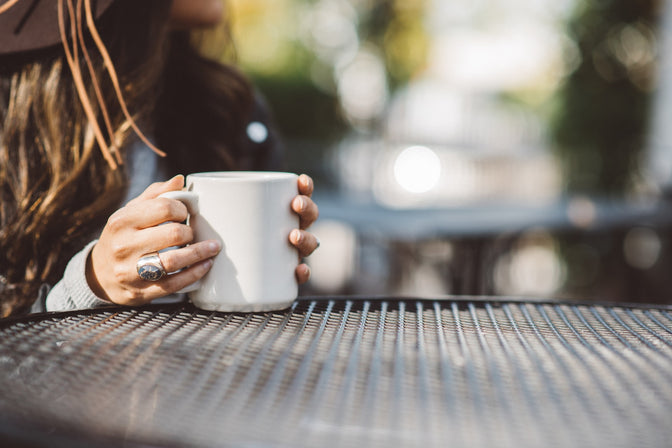 person drinking coffee