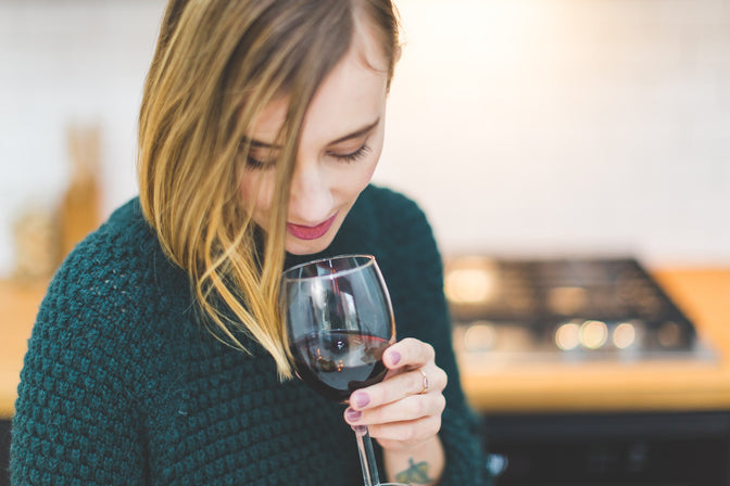 woman drinking glass of wine