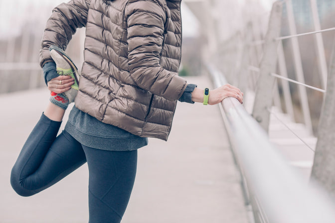 person stretching before run