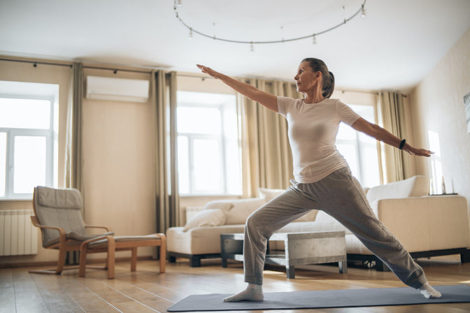 woman exercising at home