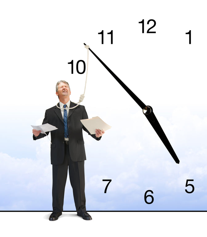 man standing by clock