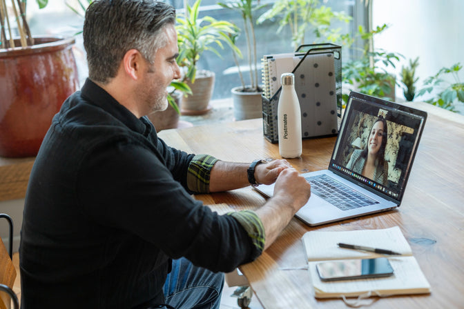 man on computer working from home