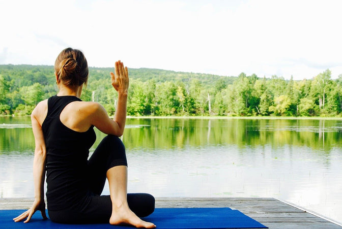 woman doing yoga to stay fit and healthy