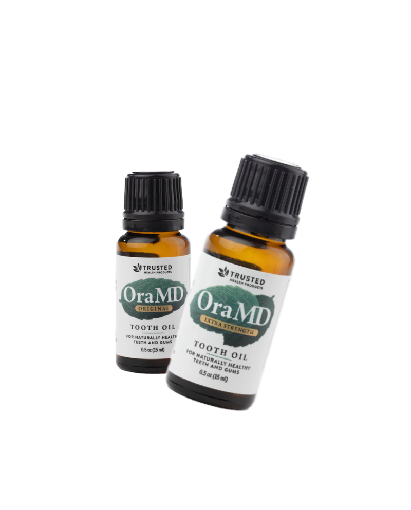 Two bottles of Ora MD tooth oil on a white background