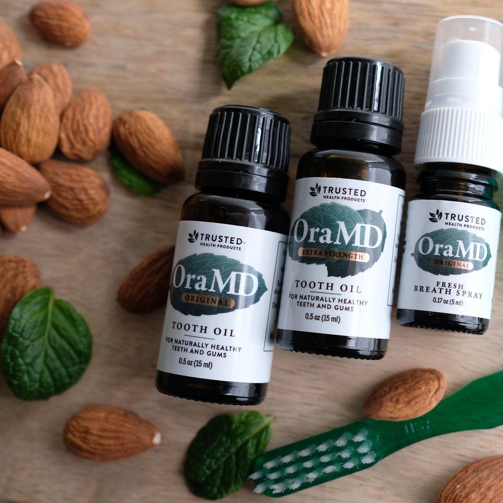 Toothpaste Alternative two OraMD Extra Strength Tooth Oil bottles and one spray bottle