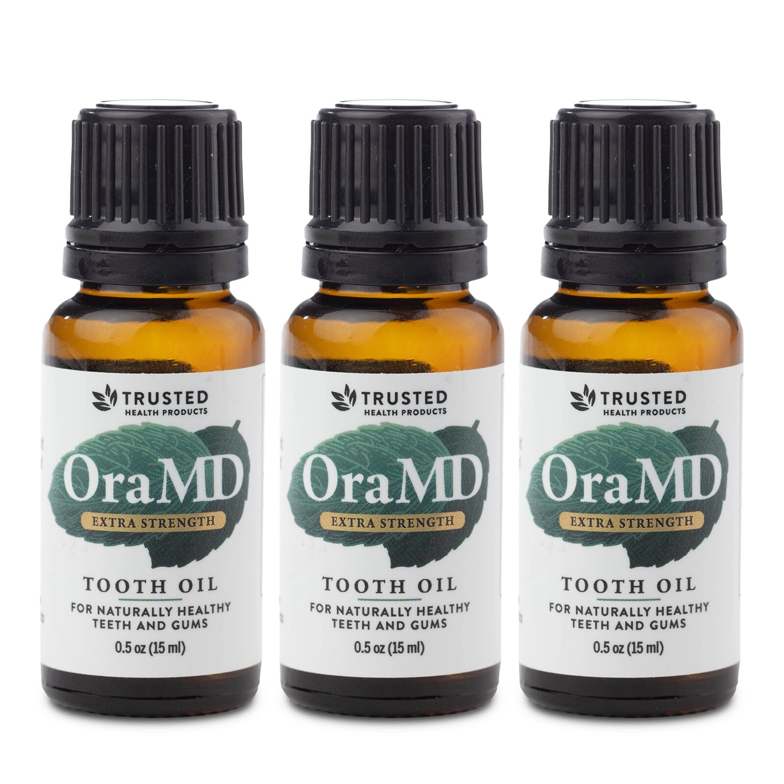 Toothpaste Alternative three bottles of OraMD Extra Strength Tooth Oil bottles